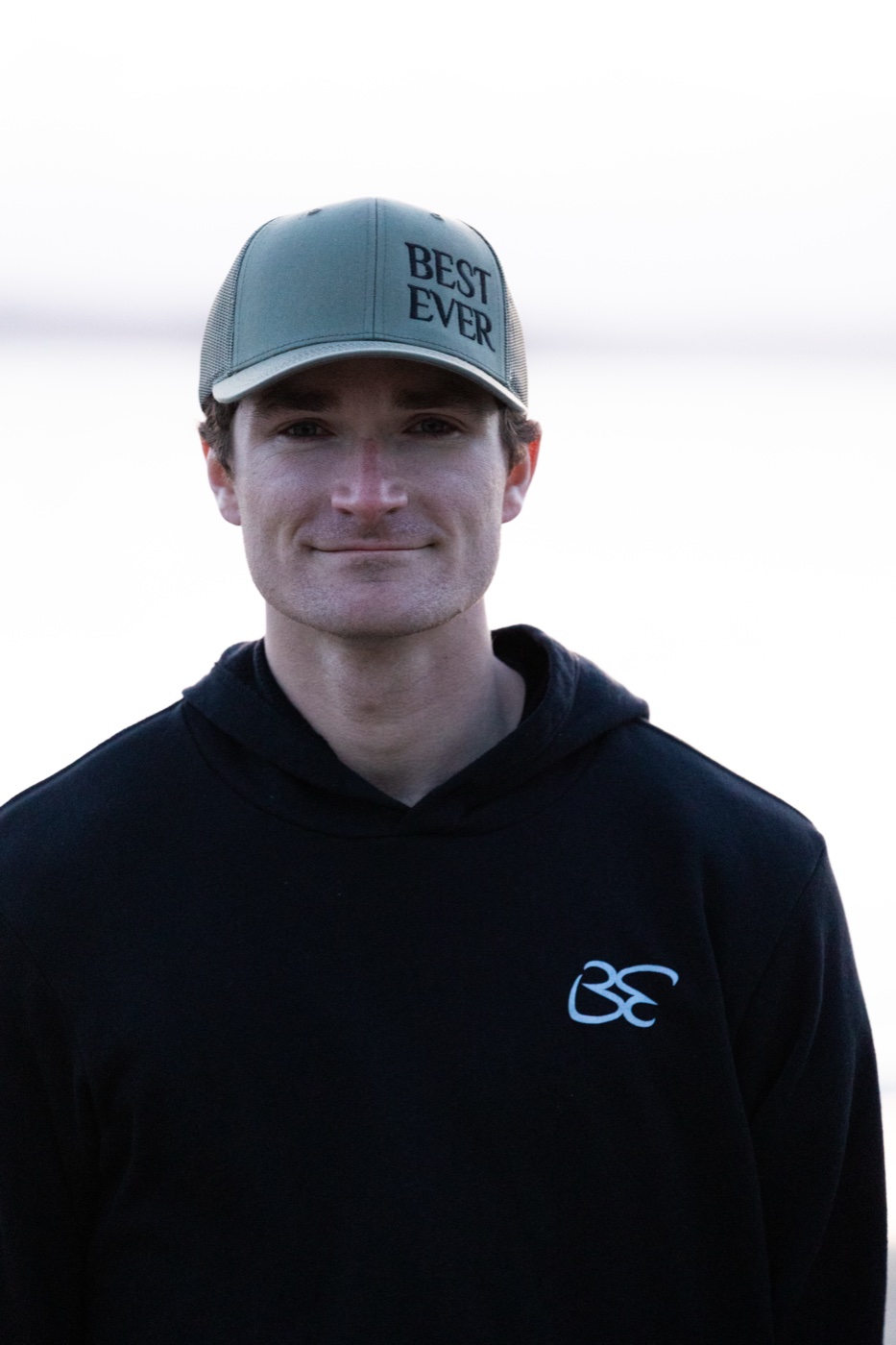 Portrait of Connor Clayton in a Best Ever hat and hoodie